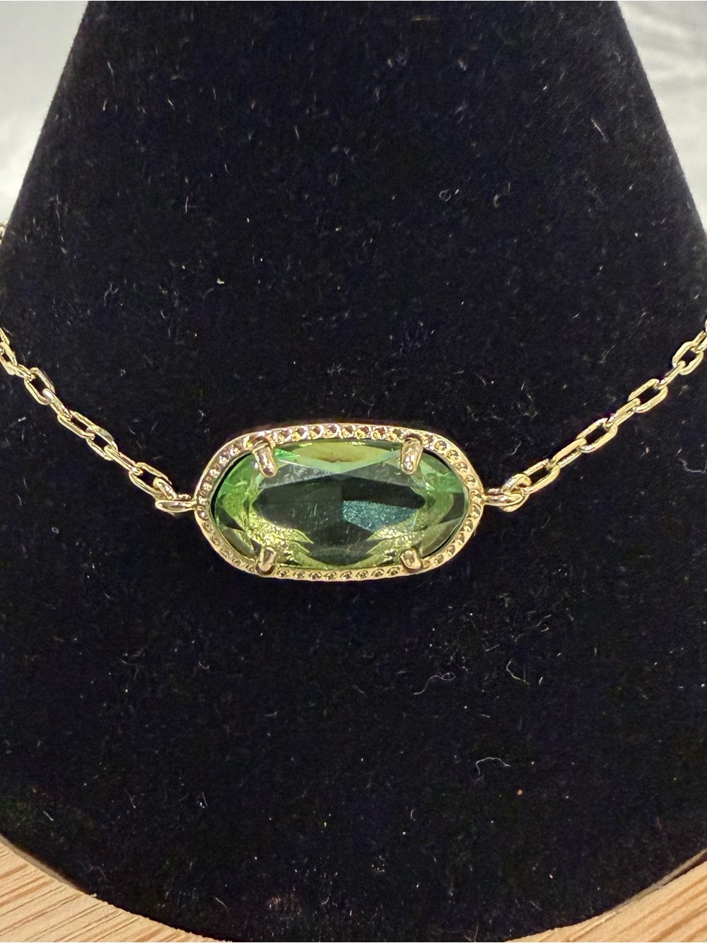 Kendra Scott Gold-Tone Bracelet with Light Green Oval Stone. New